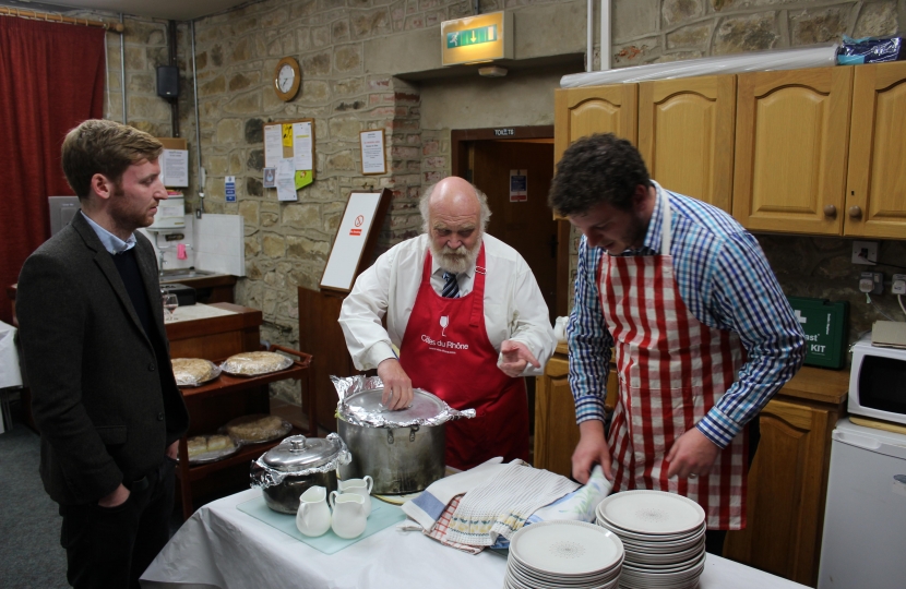 Serving food at the Pie and Pea Supper in Ashover