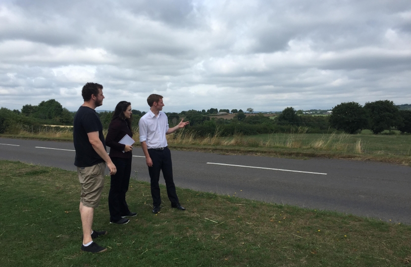 Cllr Alex Dale (left), with Cllr Angelique Foster and Lee Rowley MP close to green belt fields at Eckington Road, Coal Aston, where 200 new houses have been proposed by the District Council
